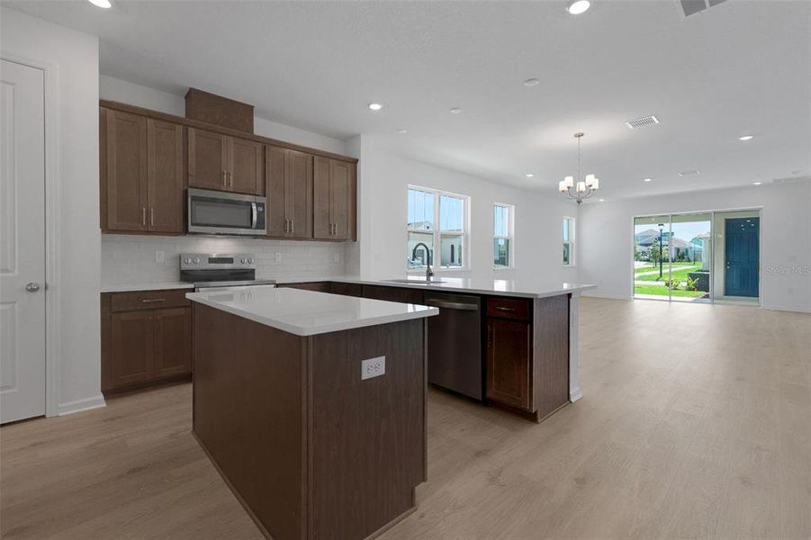 Furnished interior view inside a new home in Crossroads at Kelly Park, Apopka (Image 14).