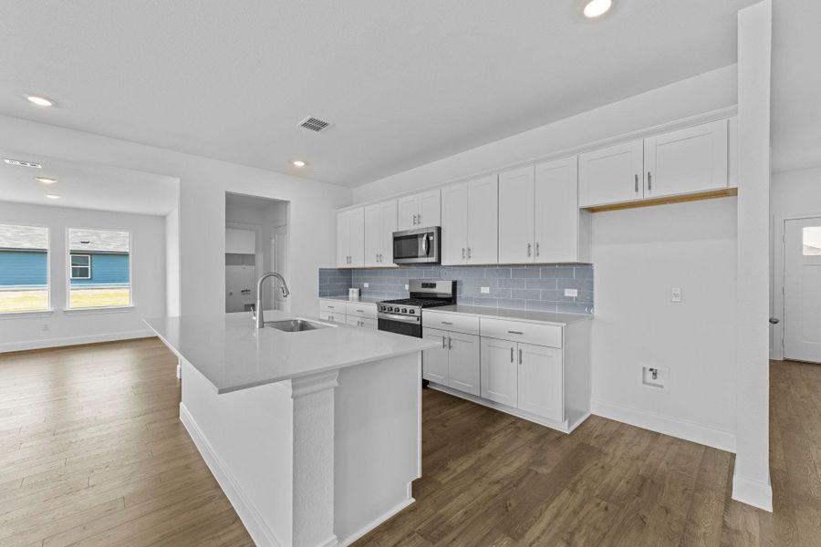 Furnished interior view inside a new home in Railhead, Cedar Creek (Image 13).