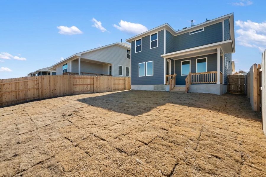 Exterior details and patio area of a home in Cannon Ranch, Dripping Springs (Image 29).
