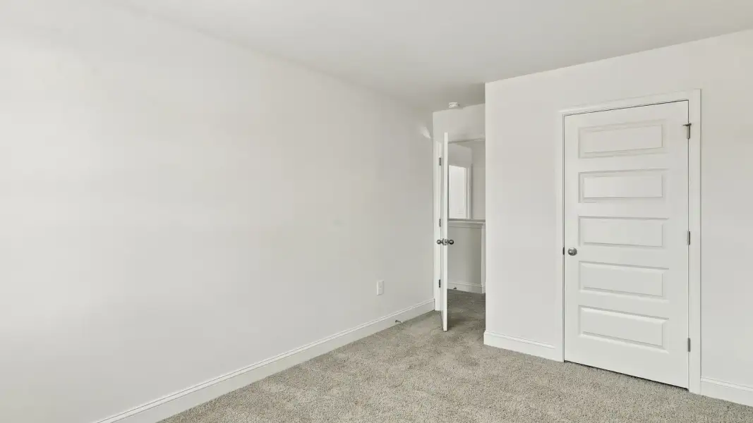 Spacious, unfurnished interior of a new home in The Lakes at North Glynn, Brunswick (Image 20).