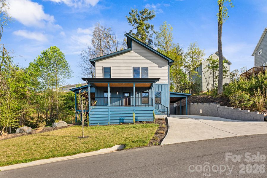 Front exterior of a new home in , Arden, NC, highlighting curb appeal (Image 28).