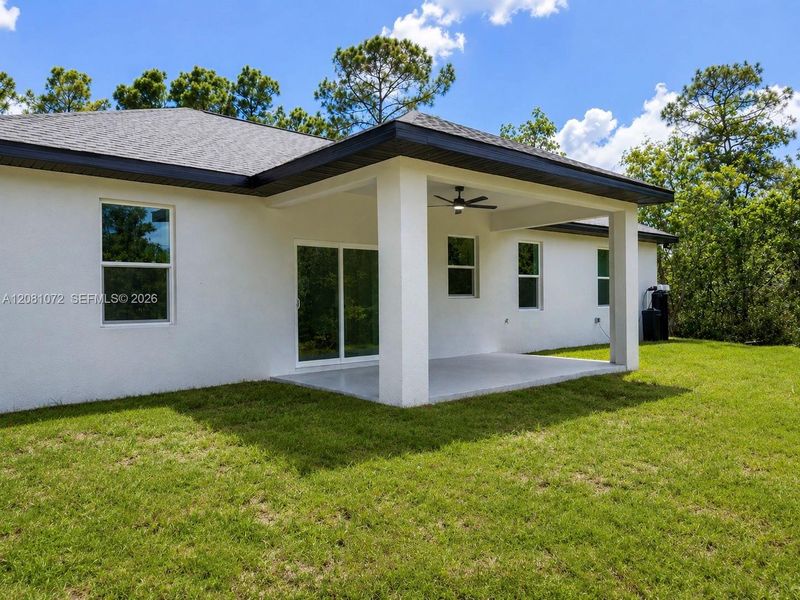 Exterior details and patio area of a home in , Sebring (Image 4).