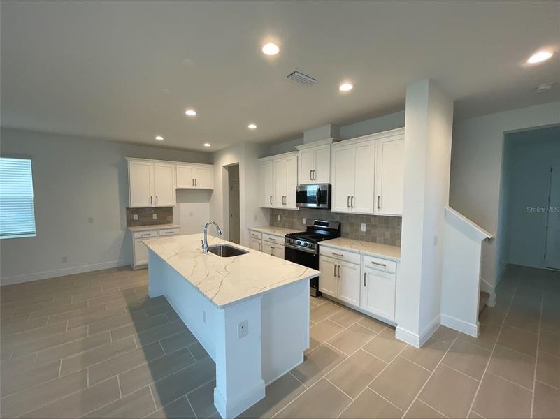 Furnished interior view inside a new home in Park View at the Hills, Minneola (Image 6).