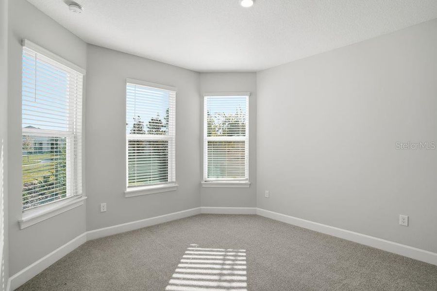 Spacious, unfurnished interior of a new home in Esplanade at Center Lake Ranch, St. Cloud (Image 23).
