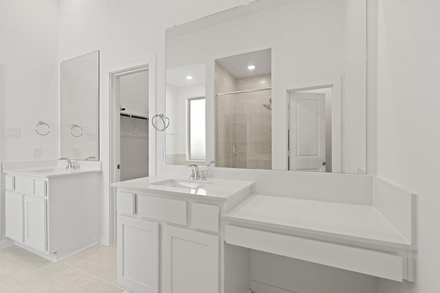 Furnished interior view inside a new home in Sunterra, Katy (Image 11).