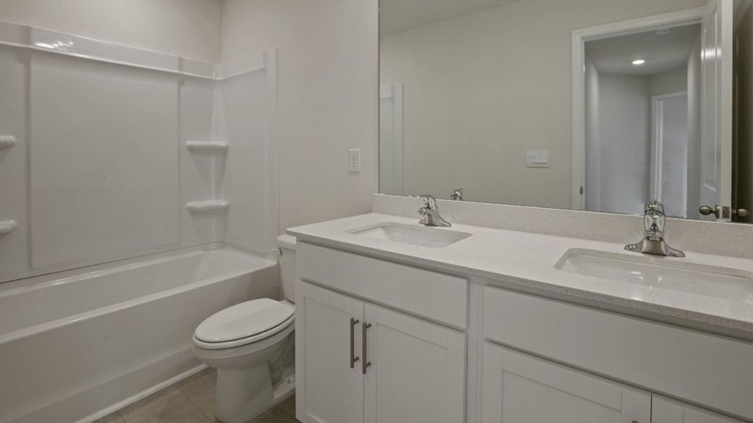 Furnished interior view inside a new home in The Grove at Matthews Landing, Fuquay Varina (Image 9).