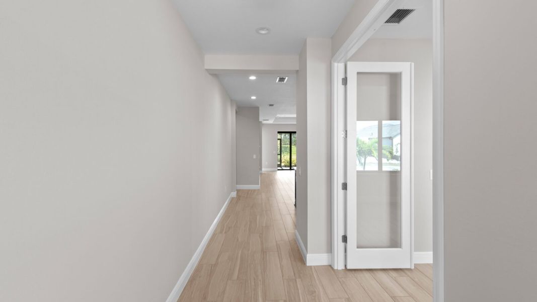 Spacious, unfurnished interior of a new home in SkySail, Naples (Image 11).