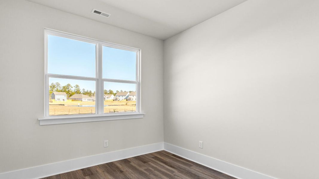 Spacious, unfurnished interior of a new home in Indigo Preserve, Leland (Image 21).
