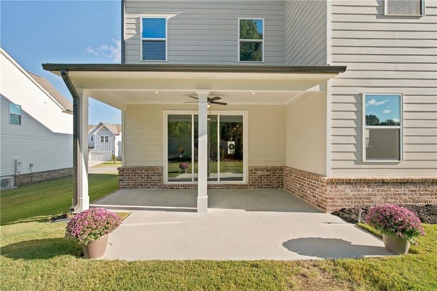 Exterior details and patio area of a home in The Paddocks at Doc Hughes, Buford (Image 28). Exterior details and patio area of a home in The Paddocks at Doc Hughes, Buford (Image 28).