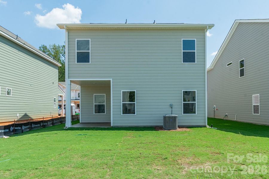 Exterior details and patio area of a home in Sunset Meadows, Charlotte (Image 3).