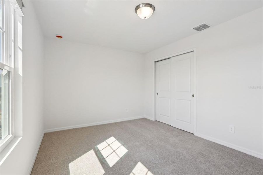 Spacious, unfurnished interior of a new home in Crosswinds - Signature Series, Haines City (Image 21).