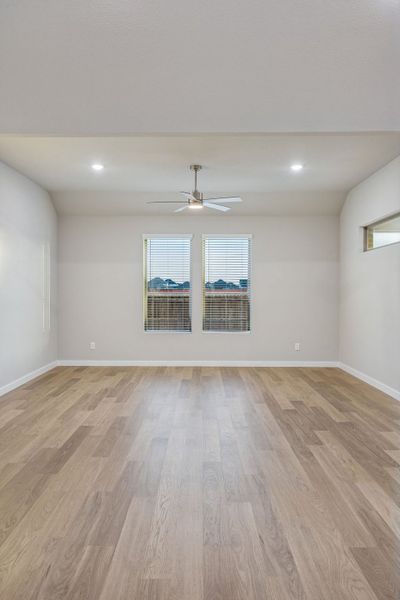 Living Room in the Wimbledon home plan by Trophy Signature Homes – REPRESENTATIVE PHOTO