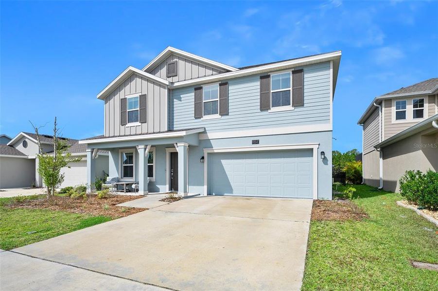 Front exterior of a new home in , Daytona Beach, FL, highlighting curb appeal (Image 26). Front exterior of a new home in , Daytona Beach, FL, highlighting curb appeal (Image 26).