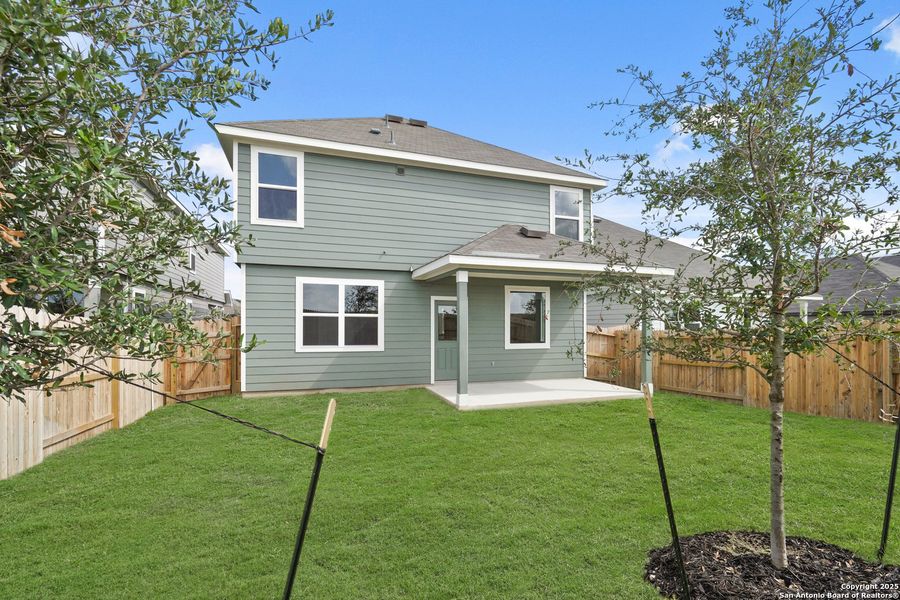 Front exterior of a new home in Timber Creek, San Antonio, TX, highlighting curb appeal (Image 18). Front exterior of a new home in Timber Creek, San Antonio, TX, highlighting curb appeal (Image 18).
