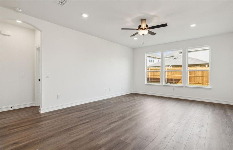 Airy gathering room with large windows *real home pictured