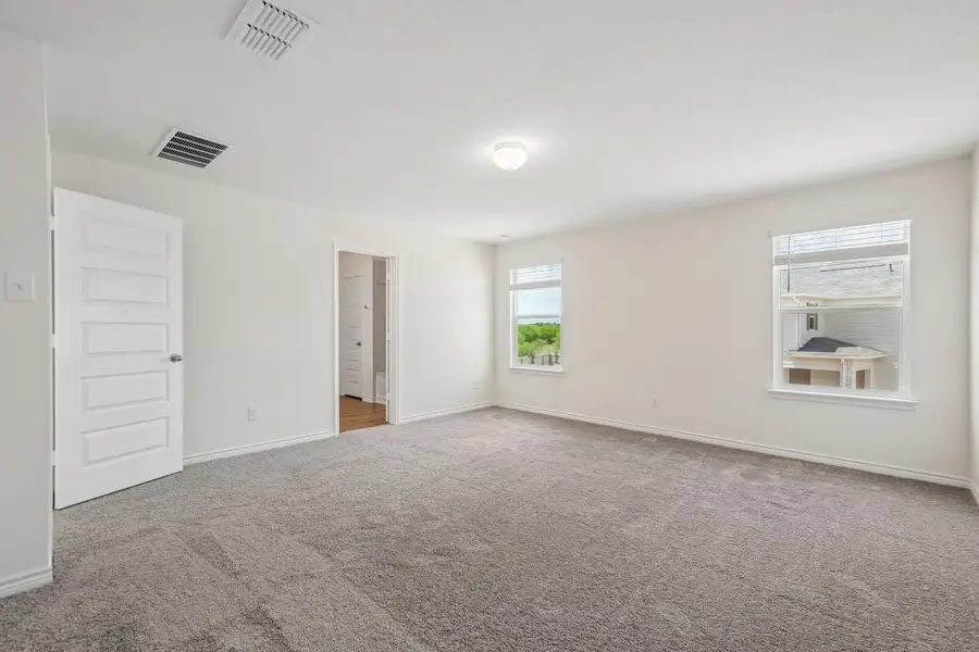 Spacious, unfurnished interior of a new home in Preserve at Culebra - Sterling Collection, San Antonio (Image 22).