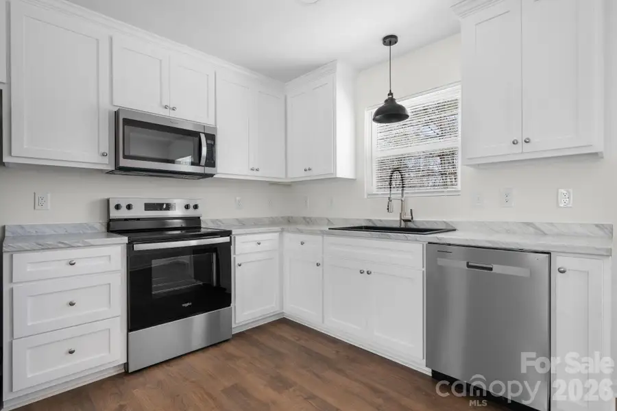 Furnished interior view inside a new home in , Valdese (Image 4).