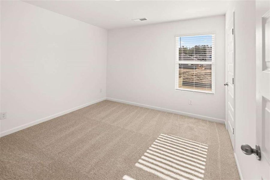 Spacious, unfurnished interior of a new home in Brooks Village, Dacula (Image 30).