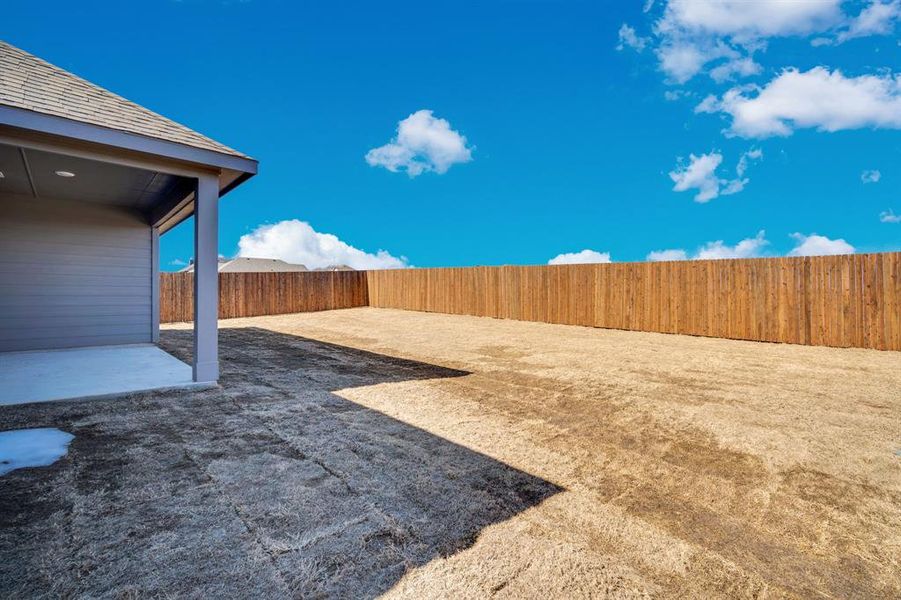 Exterior details and patio area of a home in The Preserve, Sherman (Image 17).