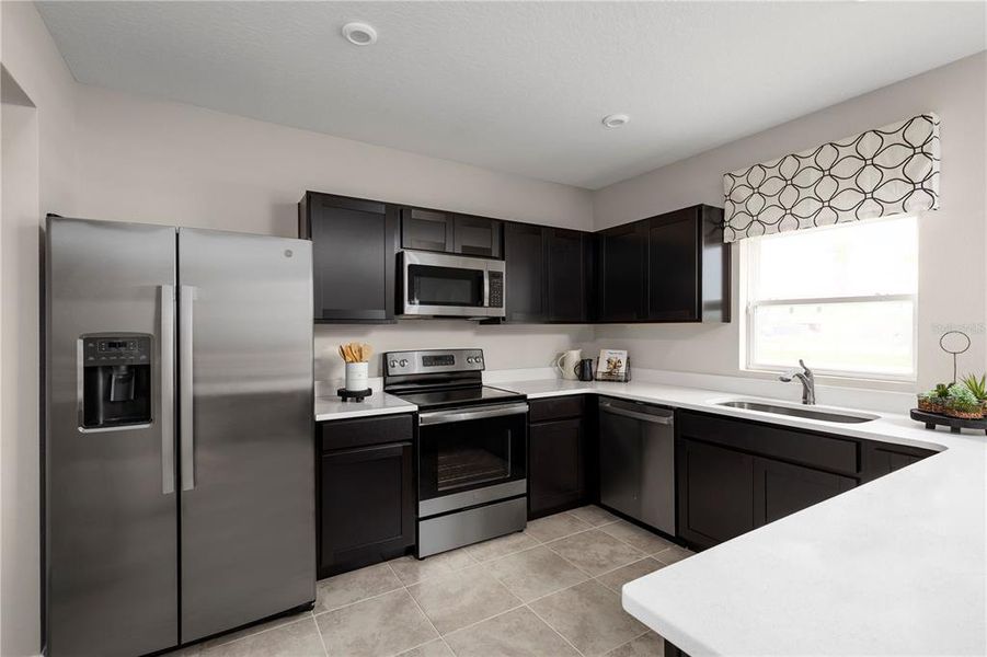 Furnished interior view inside a new home in Vista Trace, Belleview (Image 9).
