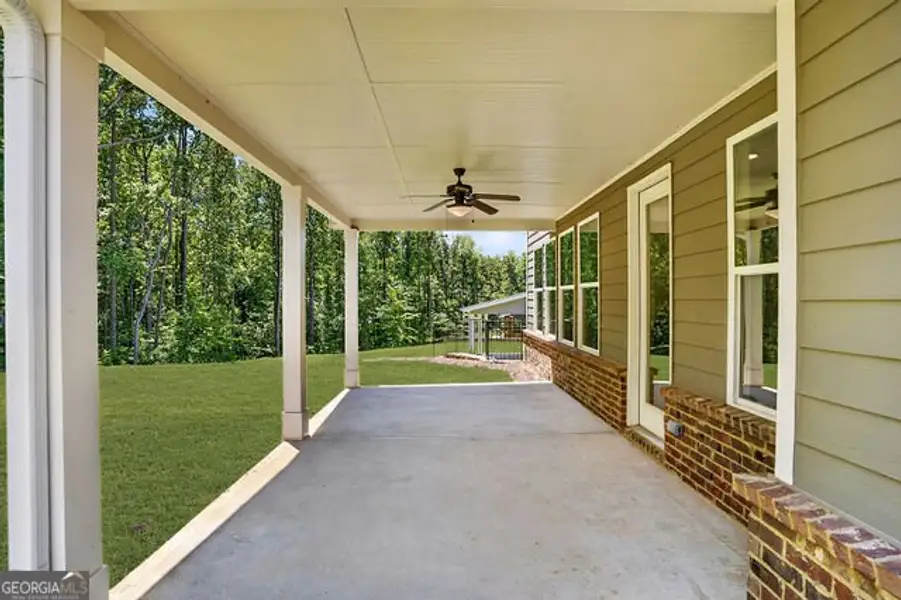 Exterior details and patio area of a home in The Manor at Gainesville Township, Gainesville (Image 3).