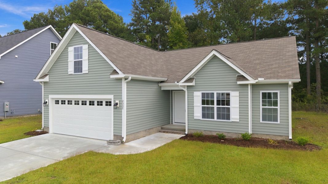 Front exterior of a new home in Davenport Farms, Winterville, NC, highlighting curb appeal (Image 17).