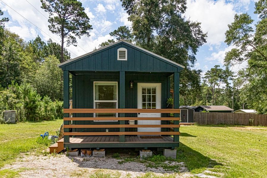 View of side porch off bedroom 2. View of side porch off bedroom 2.