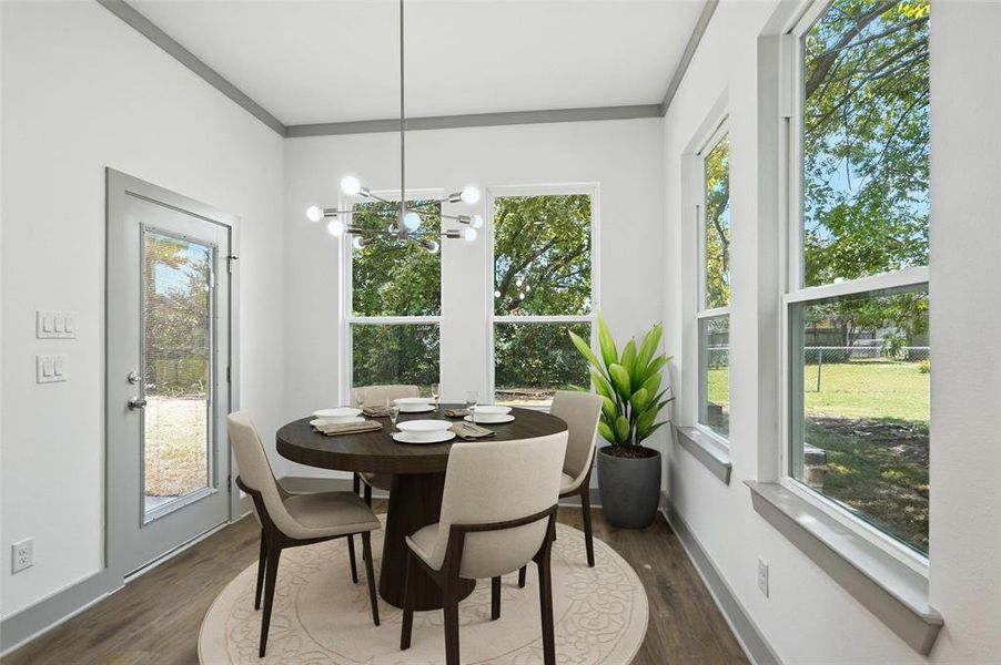 Virtually staged dining area. Virtually staged dining area.