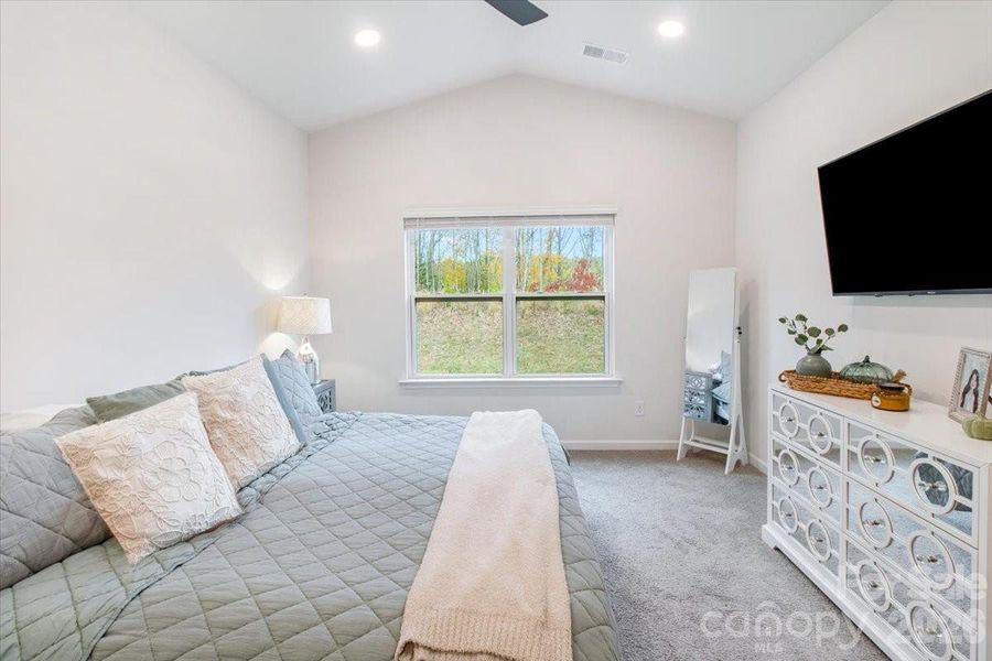 Large primary bedroom with ensuite bathroom. Large primary bedroom with ensuite bathroom.