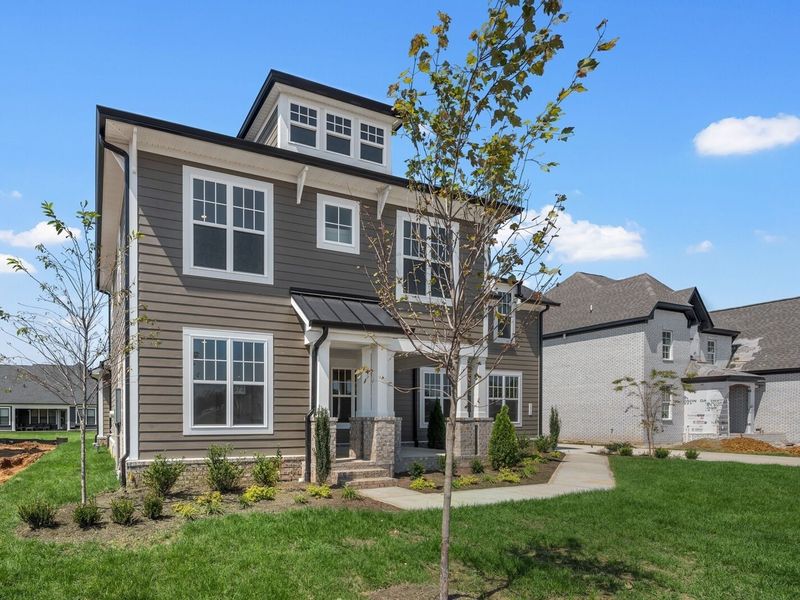Front exterior of a new home in Shelton Square, Murfreesboro, TN, highlighting curb appeal (Image 30). Front exterior of a new home in Shelton Square, Murfreesboro, TN, highlighting curb appeal (Image 30).
