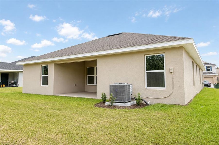 Exterior details and patio area of a home in Harmony Central, St. Cloud (Image 3).