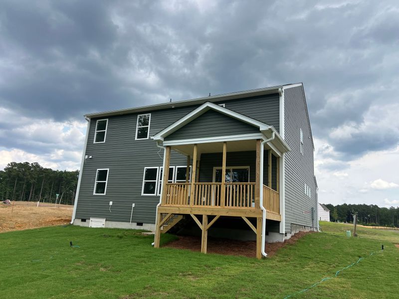 Exterior details and patio area of a home in White Oak Creek Crossing, Angier (Image 2). Exterior details and patio area of a home in White Oak Creek Crossing, Angier (Image 2).
