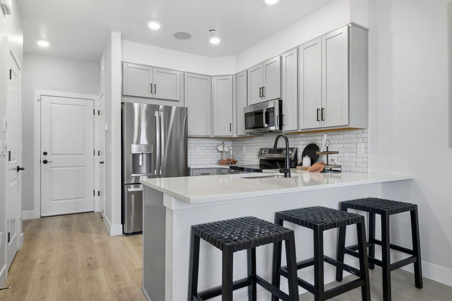 Representative furnished interior of a home built from the Backcountry by Taylor Morrison in Trailstone, Arvada (Image 5).