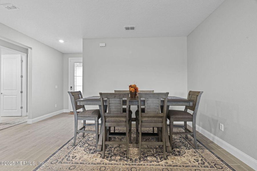 Furnished interior view inside a new home in Edenbrooke at Hyland Trail | 55+: Edenbrooke at Hyland Trail 60s, Green Cove Springs (Image 16). Furnished interior view inside a new home in Edenbrooke at Hyland Trail | 55+: Edenbrooke at Hyland Trail 60s, Green Cove Springs (Image 16).