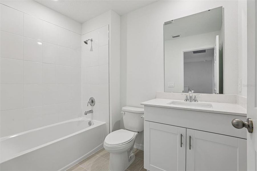 Furnished interior view inside a new home in Cagan Crossings West, Clermont (Image 14).