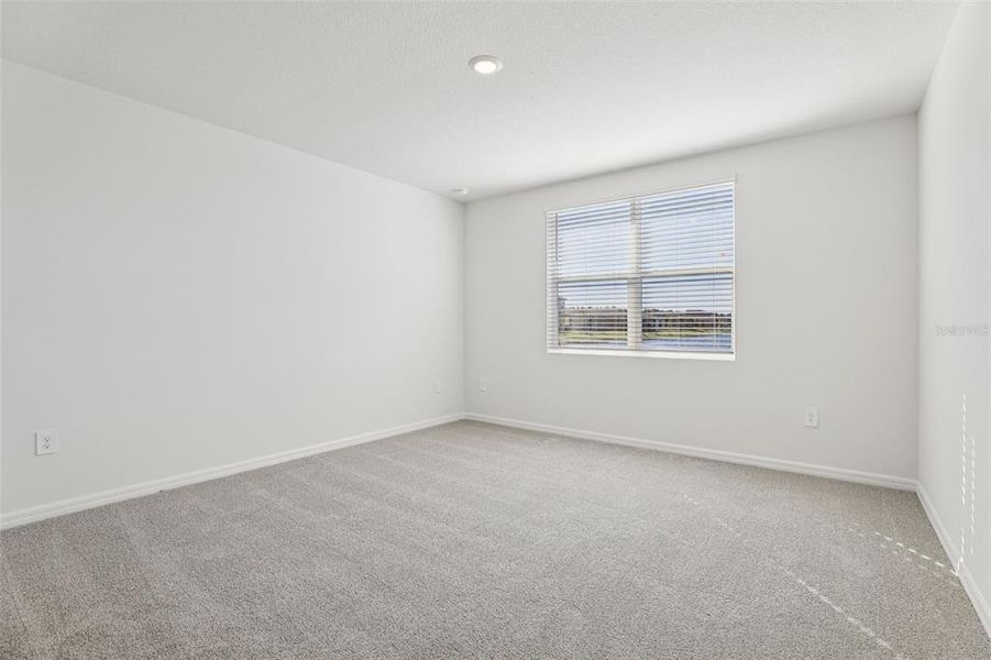 Spacious, unfurnished interior of a new home in Lake Deer Estates - Signature Series, Poinciana (Image 32).