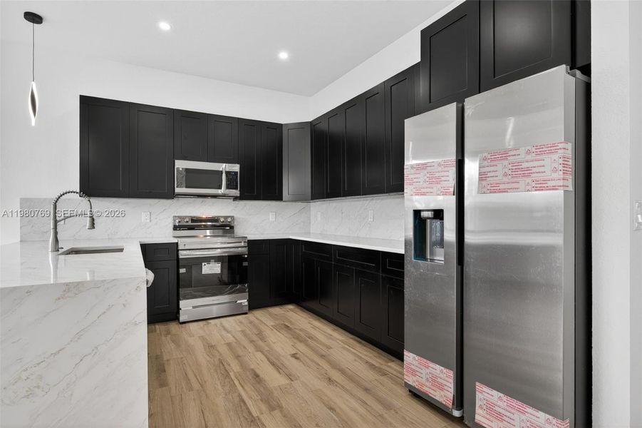 Furnished interior view inside a new home in , Fort Lauderdale (Image 9).