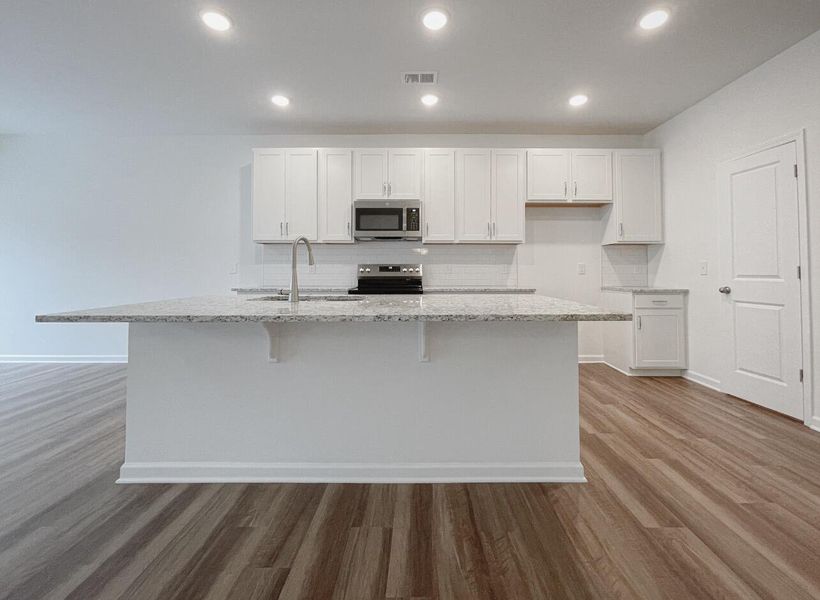 Furnished interior view inside a new home in East Main Townes, Spartanburg (Image 5).