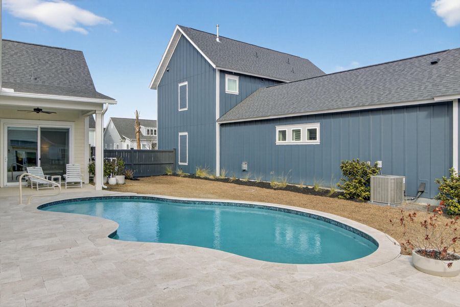 Exterior details and patio area of a home in The Domus Collection at Midtown Nexton, Summerville (Image 3). Exterior details and patio area of a home in The Domus Collection at Midtown Nexton, Summerville (Image 3).