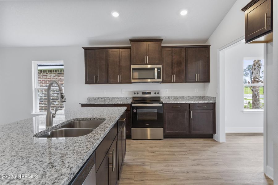 Furnished interior view inside a new home in Shadow Crest at Rolling Hills, Green Cove Springs (Image 8).