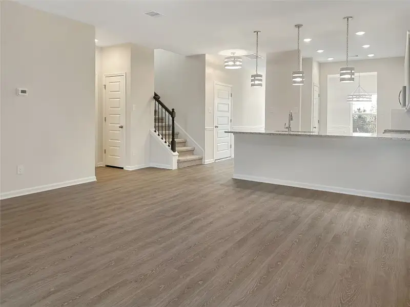 The Caldwell- Family Room. Home is under construction. Sample image for illustration; upgrades, options, and colors may vary.