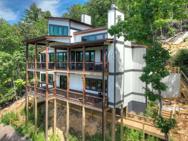 Front exterior of a new home in , Epworth, GA, highlighting curb appeal (Image 27).