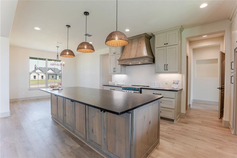 Looking toward the front dining area. Did you see that extra storage space on the front of the island as well! Look to the right of the photo - double walk-in pantry's!! Looking toward the front dining area. Did you see that extra storage space on the front of the island as well! Look to the right of the photo - double walk-in pantry's!!