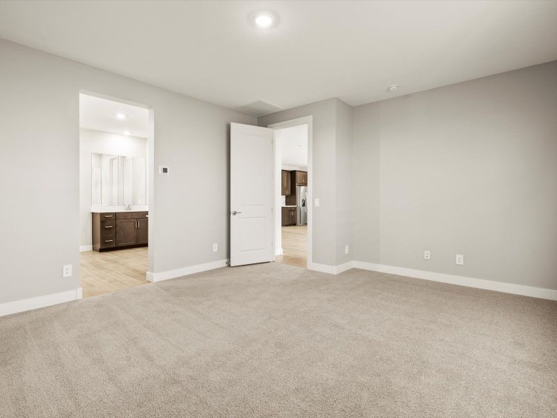 Spacious, unfurnished interior of a new home in White Tank Foothills Signature Series, Waddell (Image 13).