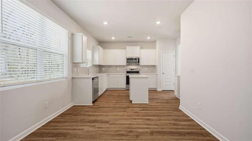 Furnished interior view inside a new home in Oakchase at Hampton, Hampton (Image 6).