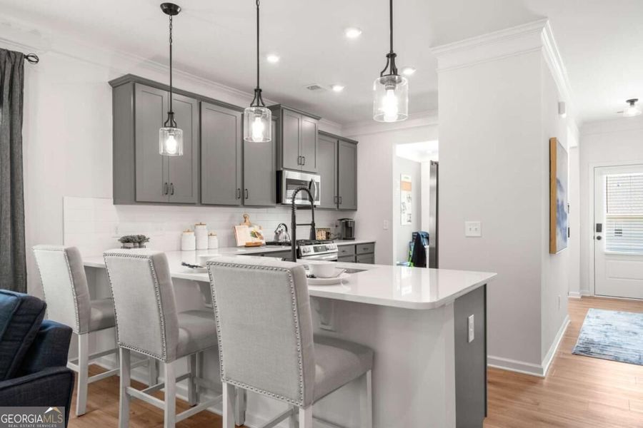 Furnished interior view inside a new home in Cobblestone Crossing Commons, Byron (Image 8).
