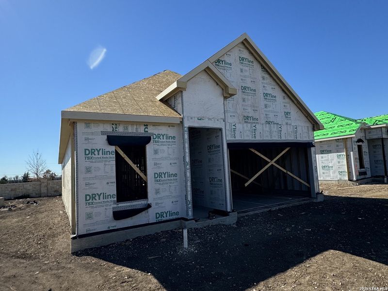 In-progress construction of a new home in Enclave at Hennersby Hollow 50's, San Antonio, TX (Image 19).