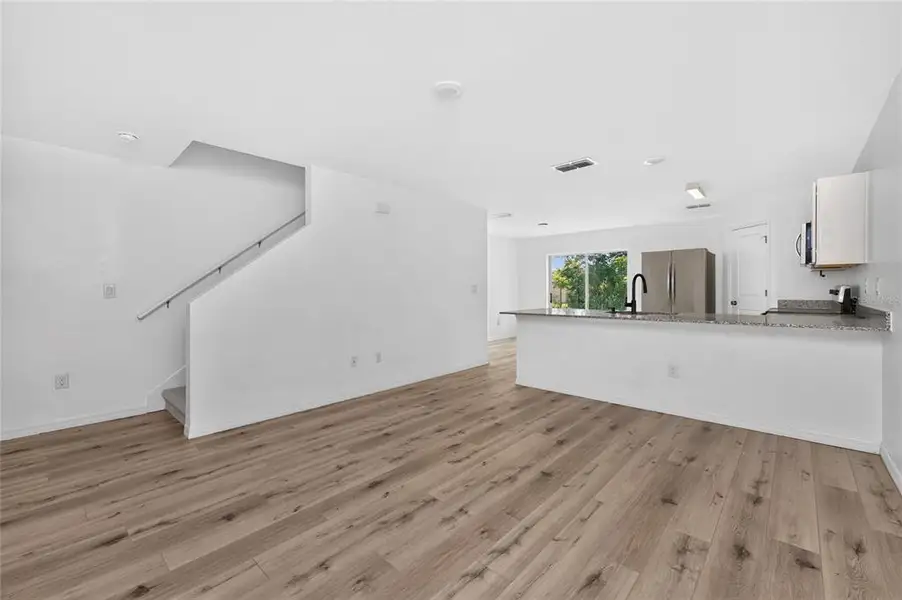 Spacious, unfurnished interior of a new home in , Port Charlotte (Image 22).