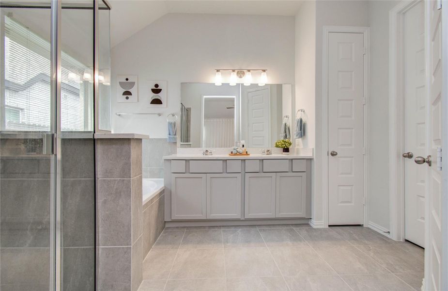 Furnished interior view inside a new home in Sunterra, Katy (Image 12).