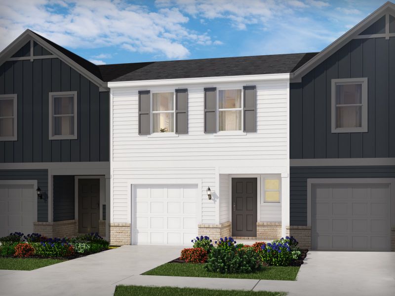 Front exterior of a new home in Crossing at Abner Creek Townes, Greer, SC, highlighting curb appeal (Image 1). Front exterior of a new home in Crossing at Abner Creek Townes, Greer, SC, highlighting curb appeal (Image 1).